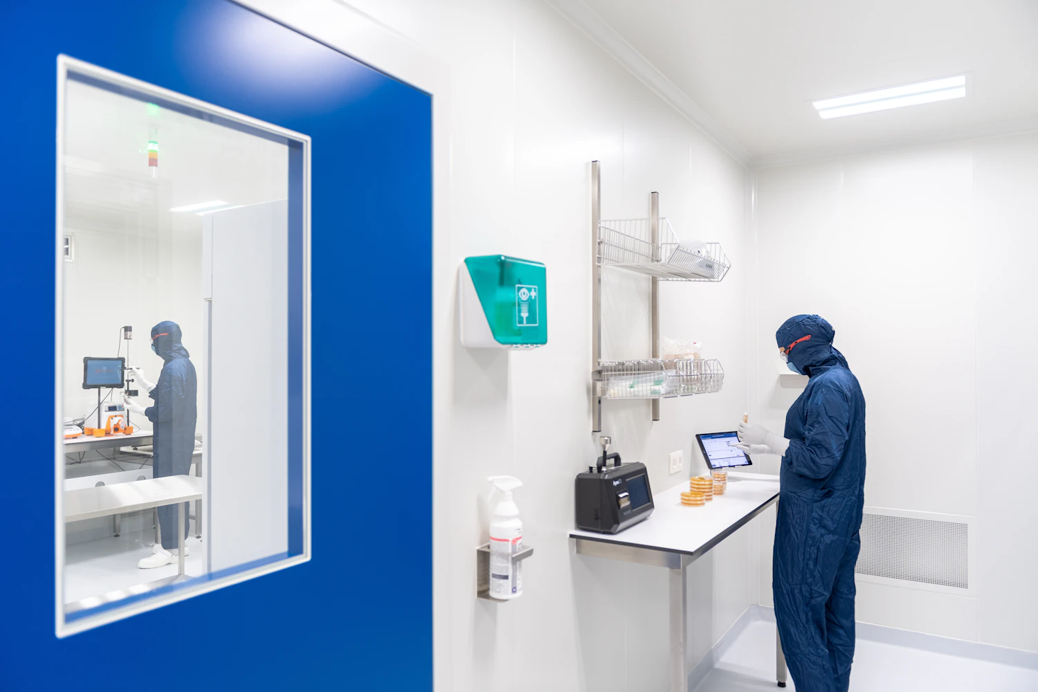 Cleanroom specialist monitoring a controlled process